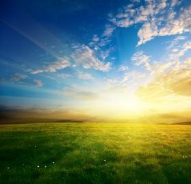 Spring sunrise sunset grass field blue sky white clouds